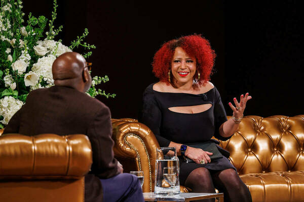 Pulitzer Prize-winner and University of Notre Dame alumna Nikole Hannah-Jones talks with Professor Mark Sanders during a Sr. Kathleen Cannon, O.P., Distinguished Lecture Series event on campus in March 2022.